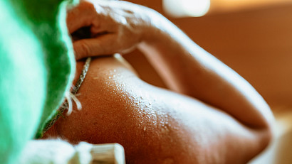 Aftercare products being gently applied to skin following a hair removal service